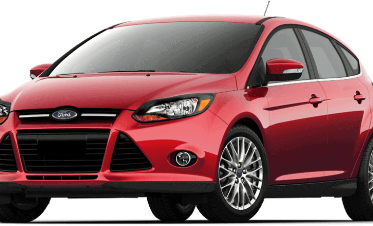 Compacte voiture rouge Ford avec phares en amande et jantes en alliage.