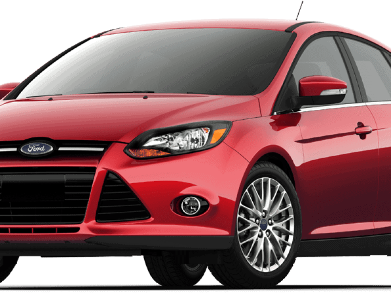 Compacte voiture rouge Ford avec phares en amande et jantes en alliage.